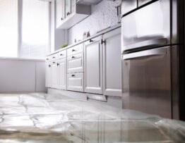 Water damage to homeowners kitchen floor