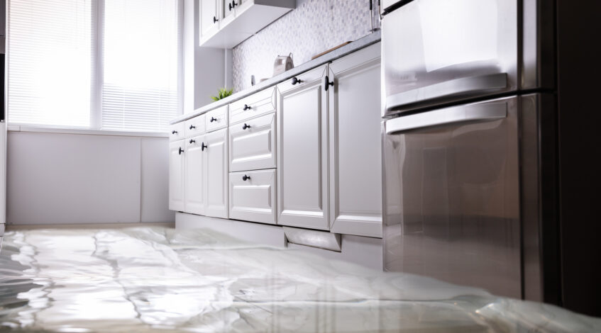 Water damage to homeowners kitchen floor